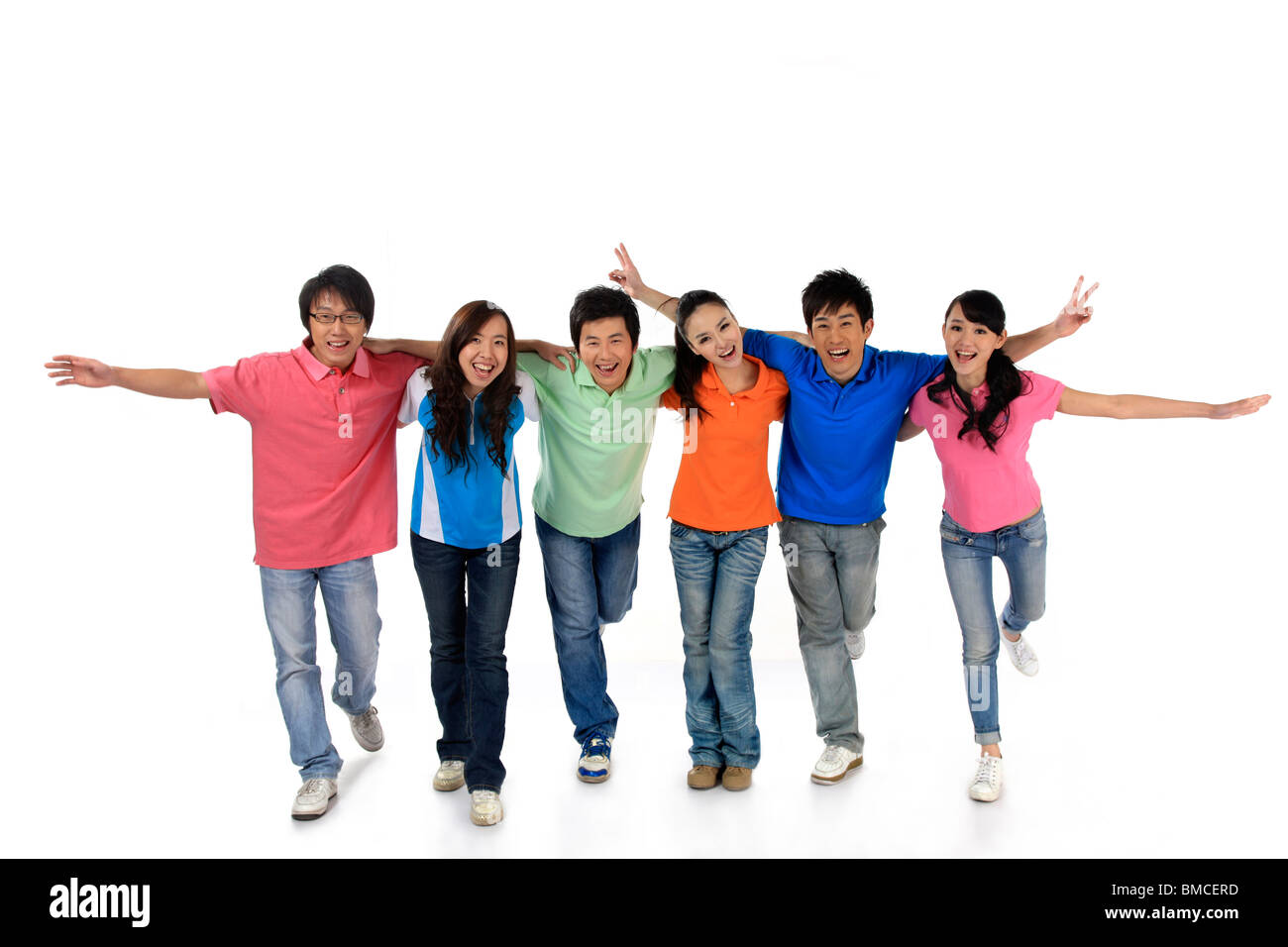 Groupe de personnes adoptant pour la joie Banque D'Images