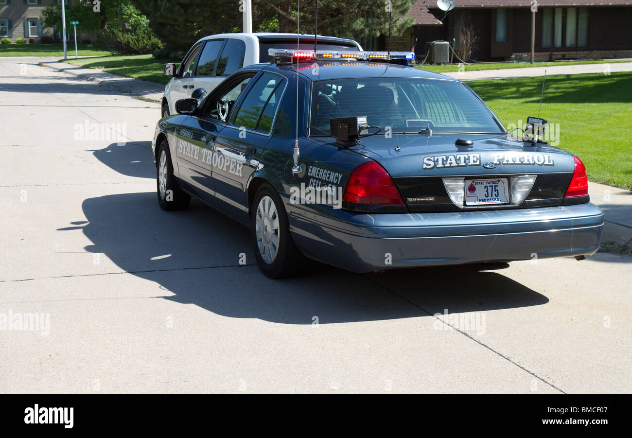 Arrêt du trafic, à l'aide d'un lecteur de plaque minéralogique, LPR, les Troopers permet d'obtenir instantanément une information sur le véhicule à l'arrêt State Police Banque D'Images