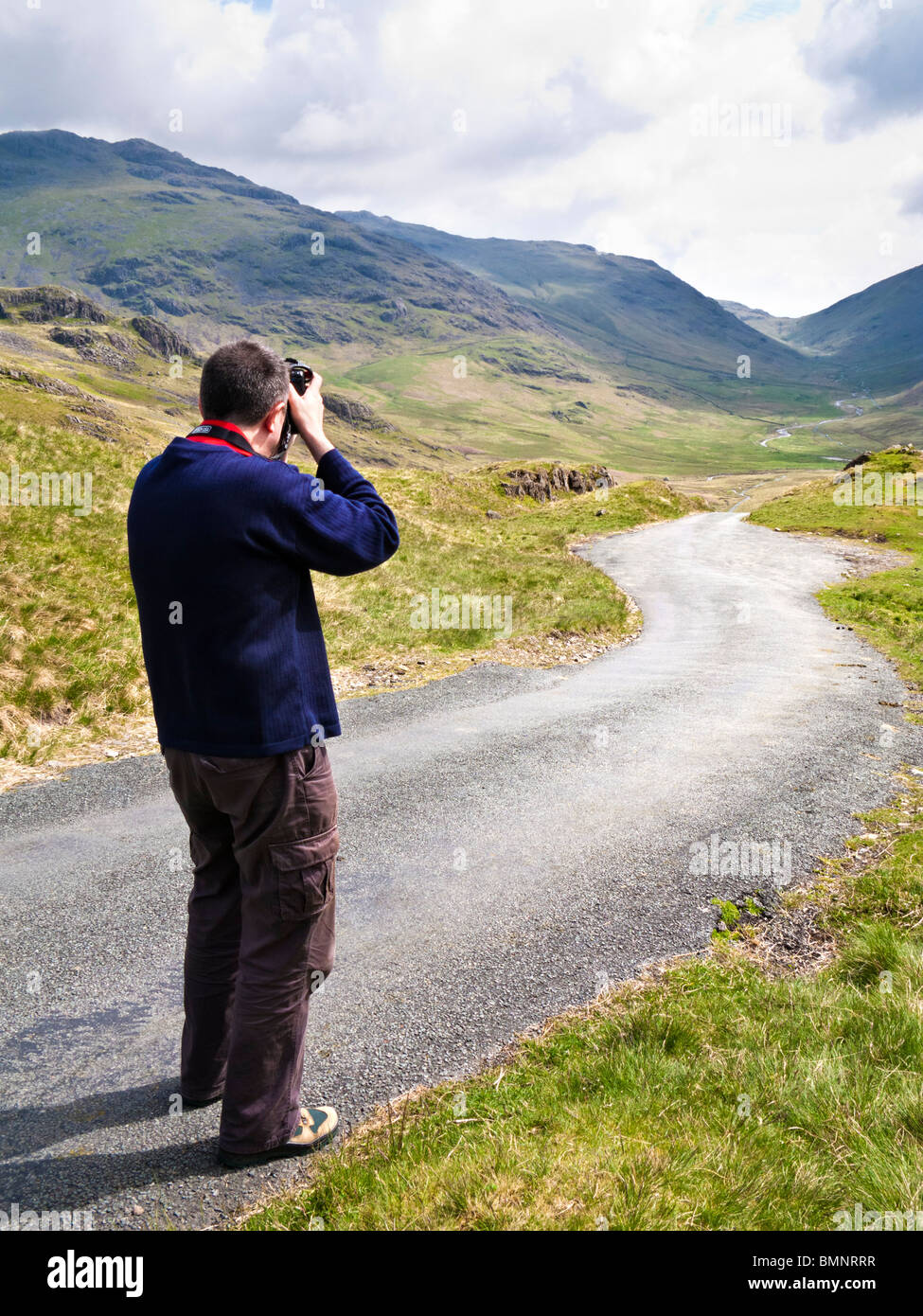 Photographe touristique dans le Lake District Angleterre Royaume-uni - MR Banque D'Images