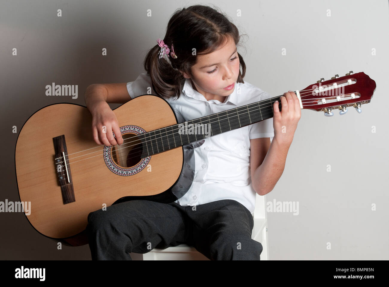 Leçon de guitare Banque D'Images