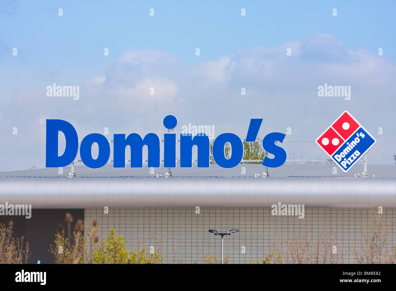 Dominos Pizza signe sur warehouse Banque D'Images