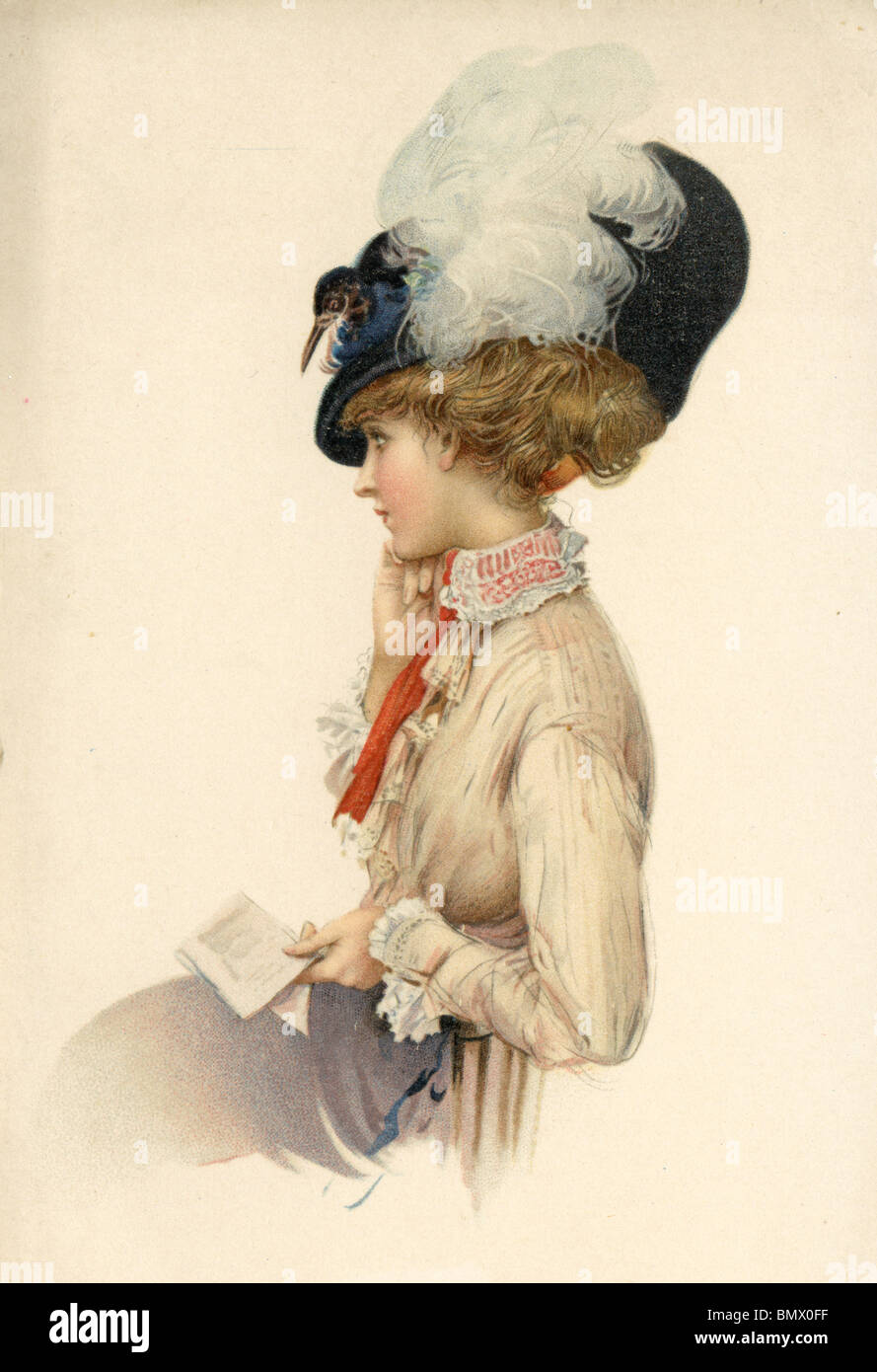 Femme avec un chapeau de plumes Banque D'Images