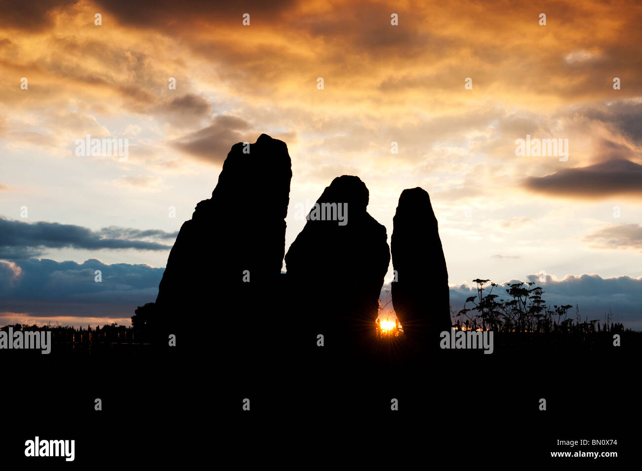 Le Rollright stones, Le Whispering Knights, Oxfordshire, Angleterre. Silhouette Banque D'Images