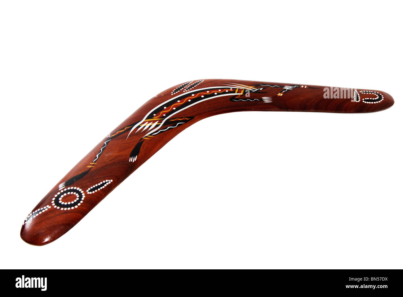 Le boomerang fait main marron sur fond blanc Banque D'Images