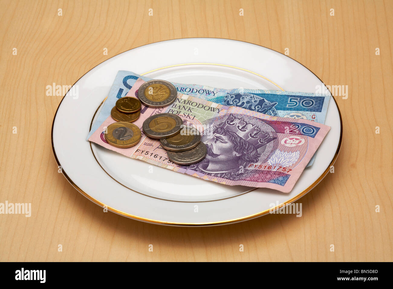 Devise polonaise Zloty et Grosz portant sur la plaque de la Chine Banque D'Images