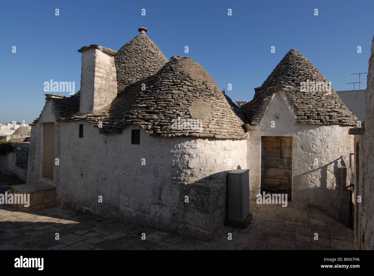 Alberobello pierre househouses truulli rock toit rond italie pouilles trullo Banque D'Images