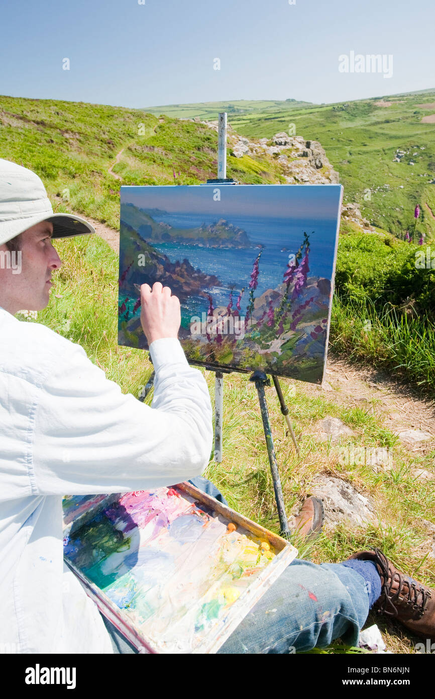 Peinture d'un artiste à l'extérieur sur Zennor Tête dans Cornwall, UK. Banque D'Images