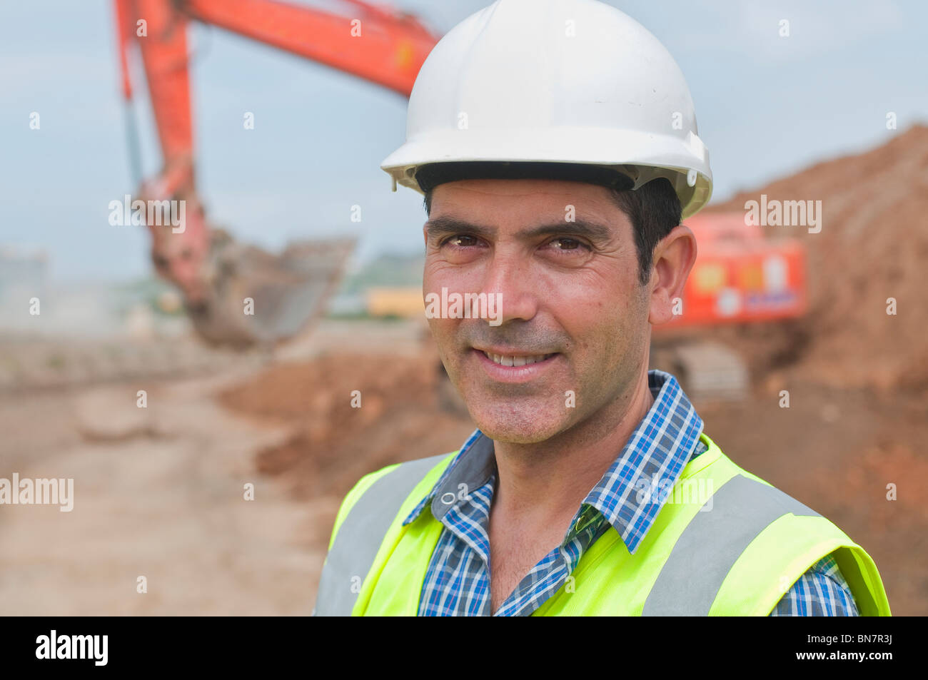 Hispanic construction worker on construction site Banque D'Images
