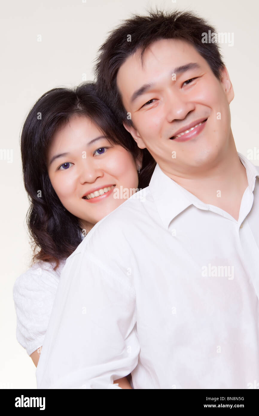 Couple asiatique avec des sourires sur le visage Banque D'Images