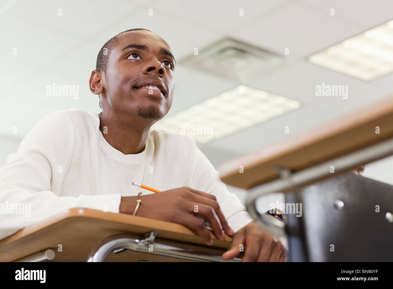 High school student sitting in classroom Banque D'Images