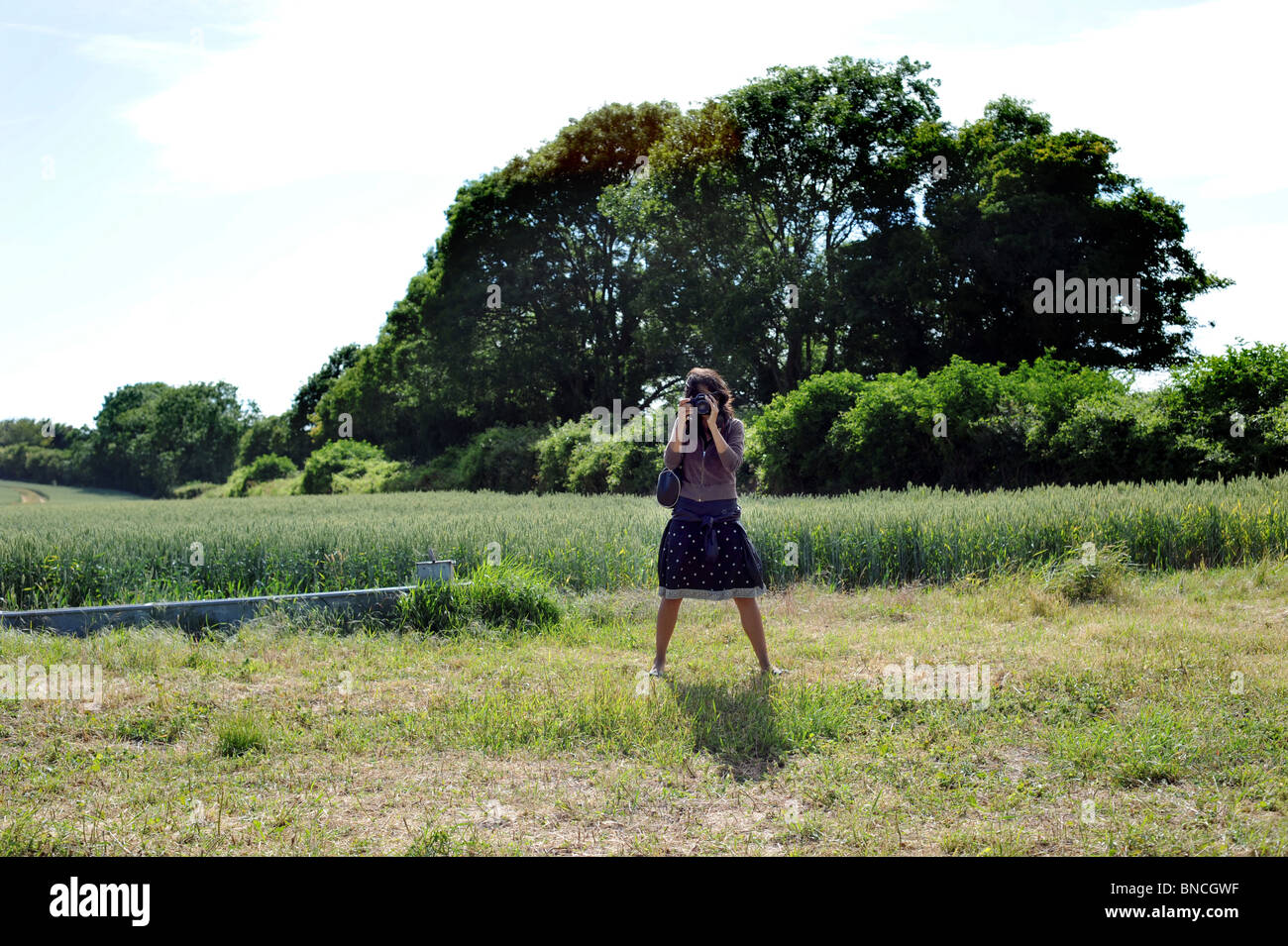 Une femme prise d'une photo Banque D'Images
