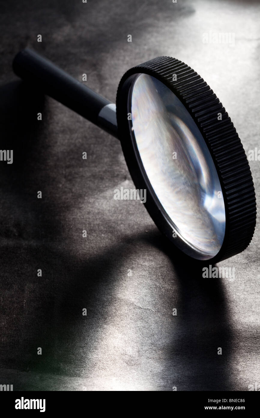 Loupe sur fond noir Banque D'Images
