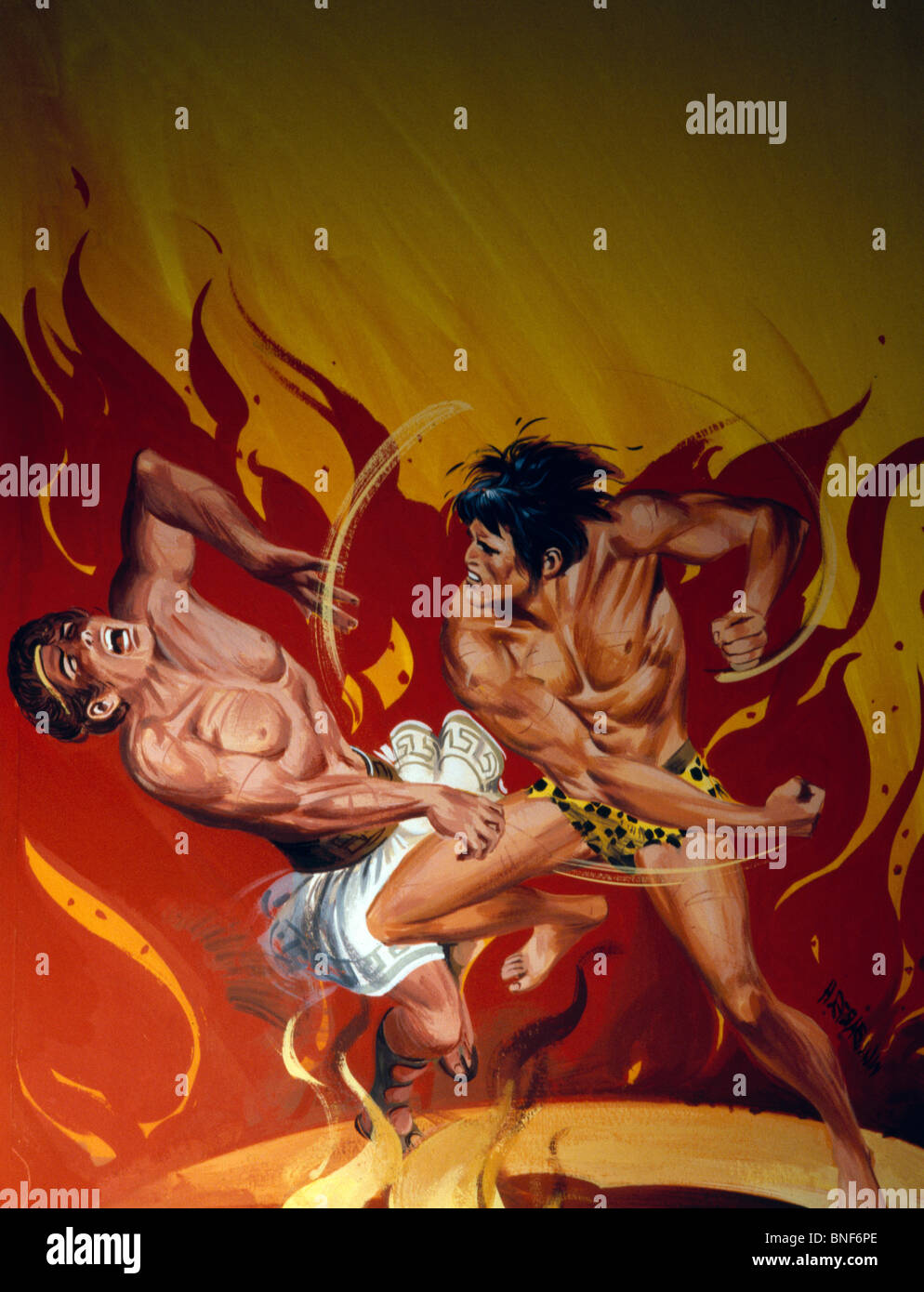 Les combats avec Tarzan homme musclé en face des équipements Banque D'Images