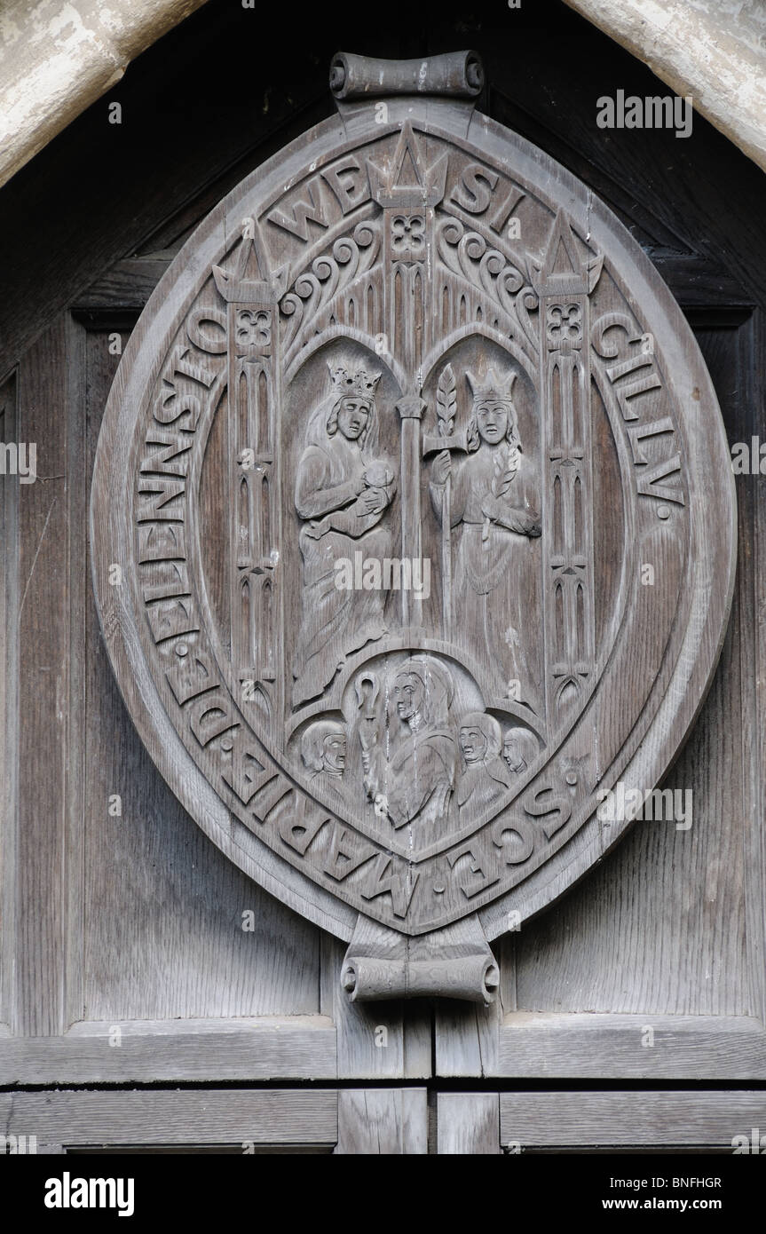 Sculpture en bois du joint de Elstow Abbey, au-dessus d'une porte de l'église de St.Mary & St.Helena dans Elstow, Bedfordshire, Angleterre Banque D'Images