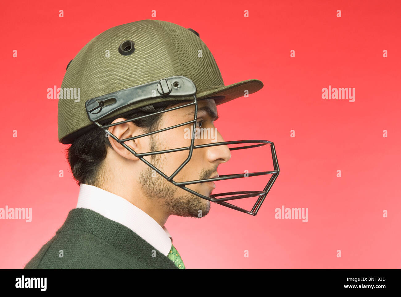 Businessman wearing a helmet cricket Banque D'Images