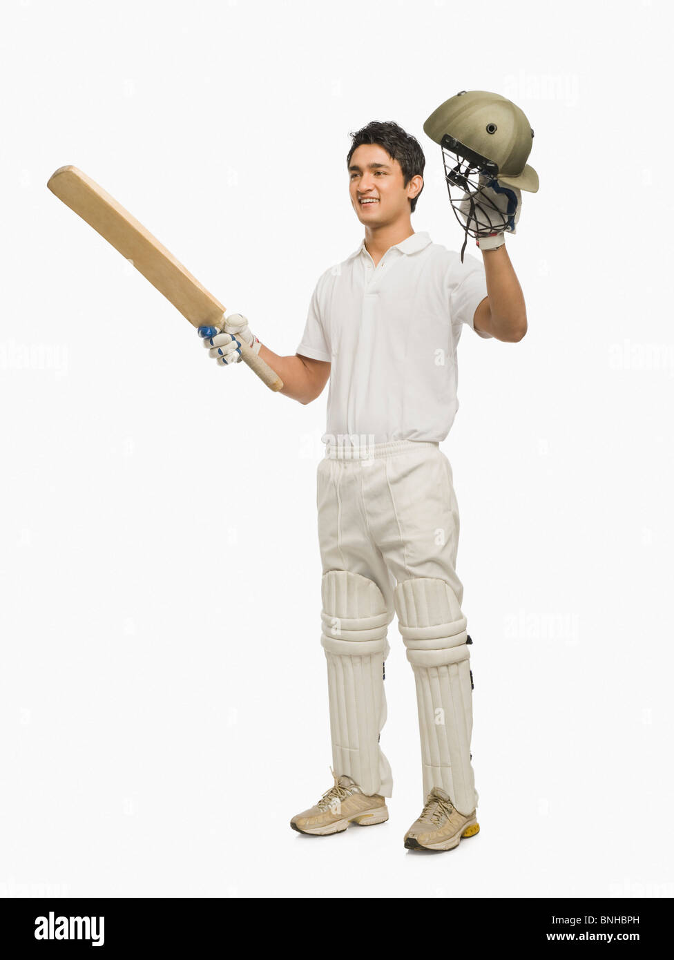 Batteur de Cricket célèbre son succès Banque D'Images