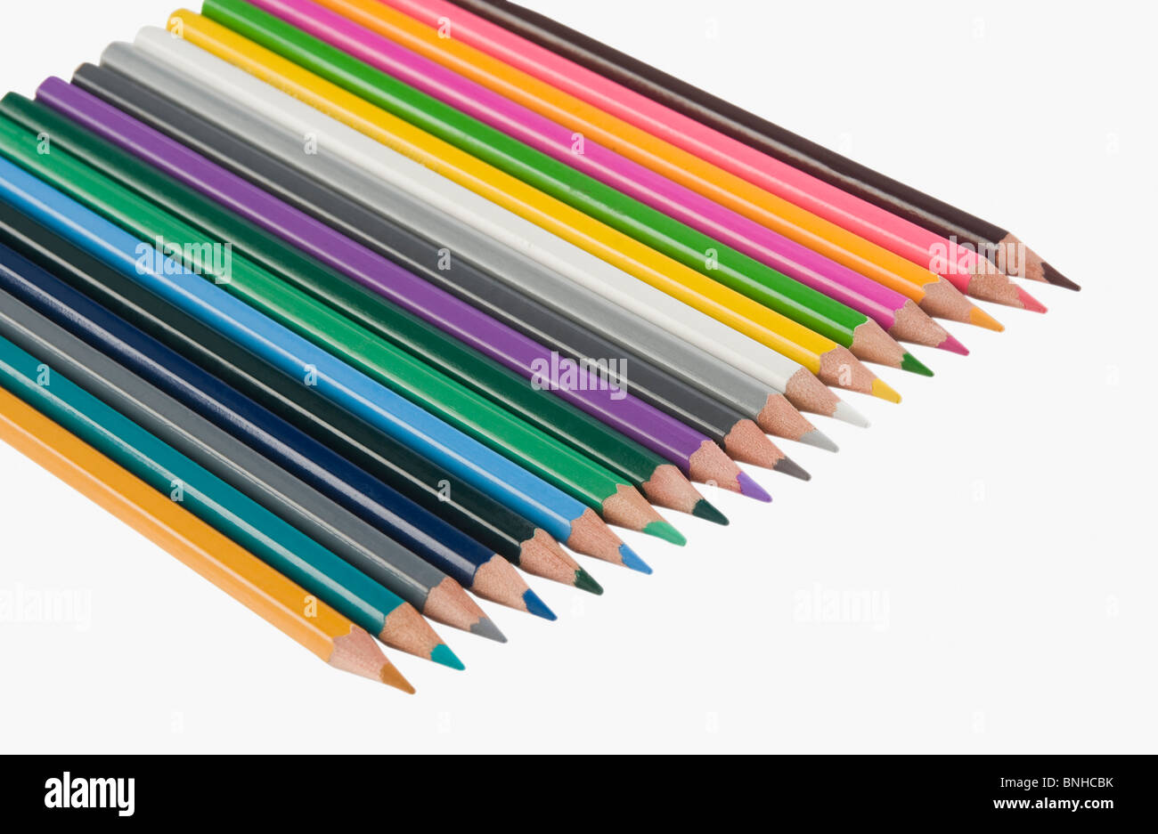 Close-up de crayons de couleur dans une rangée Banque D'Images Close-up de crayons de couleur dans une rangée Banque D'Images