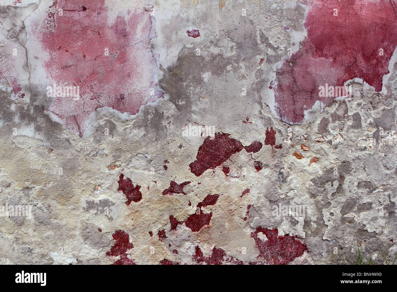 Grunge de ciment patiné rose rouge wall background Banque D'Images
