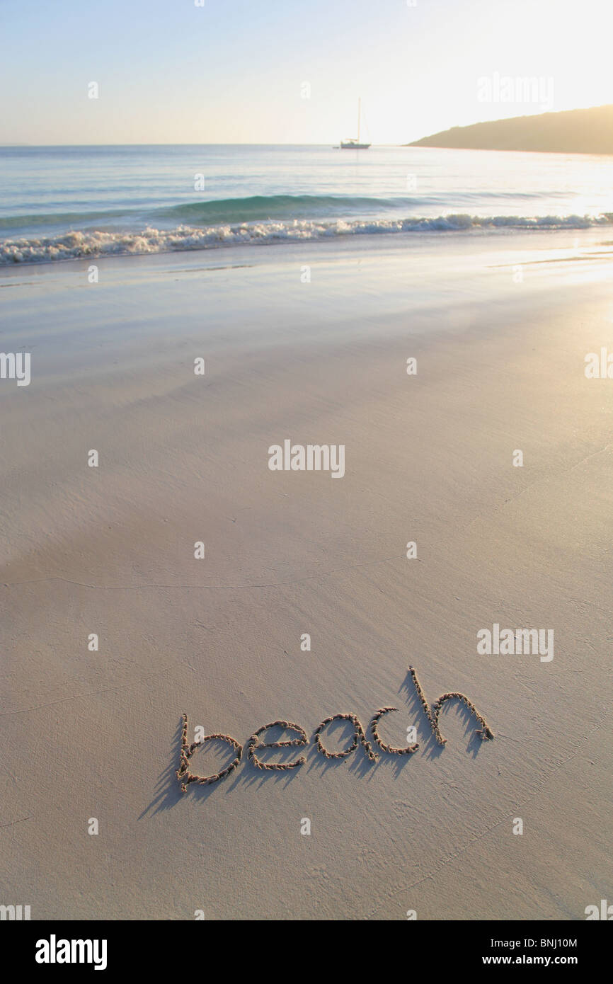 L'écriture on beach Banque D'Images