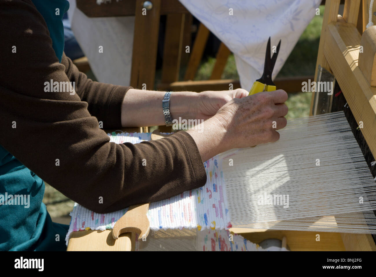 Mains par tissage Banque D'Images