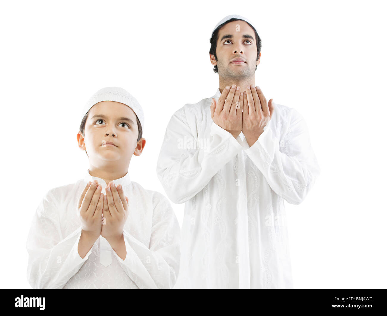 Musulman et son fils priant Banque D'Images
