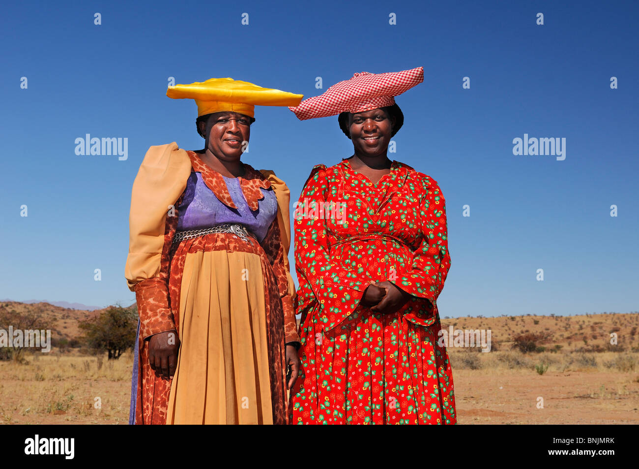 Les femmes Herero Khorixas Damaraland Namibie Région Kunene Afrique Voyage costume traditionnel hat Banque D'Images