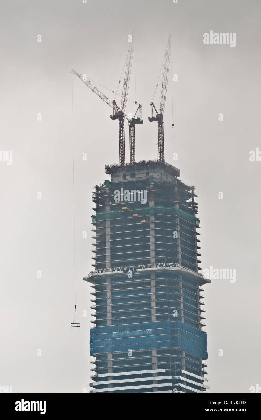 La CPI en construction dans l'Ouest de Kowloon, qui sera bientôt la plus haute tour de Hong Kong. Banque D'Images