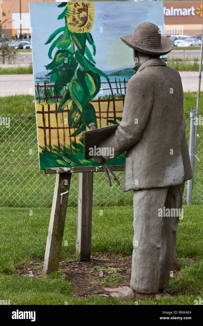 Tulip Time festival Hollande Michigan aux Etats-Unis Statue d'un peintre debout peignant un tableau à l'extérieur personne vertical de dos derrière haute résolution Banque D'Images
