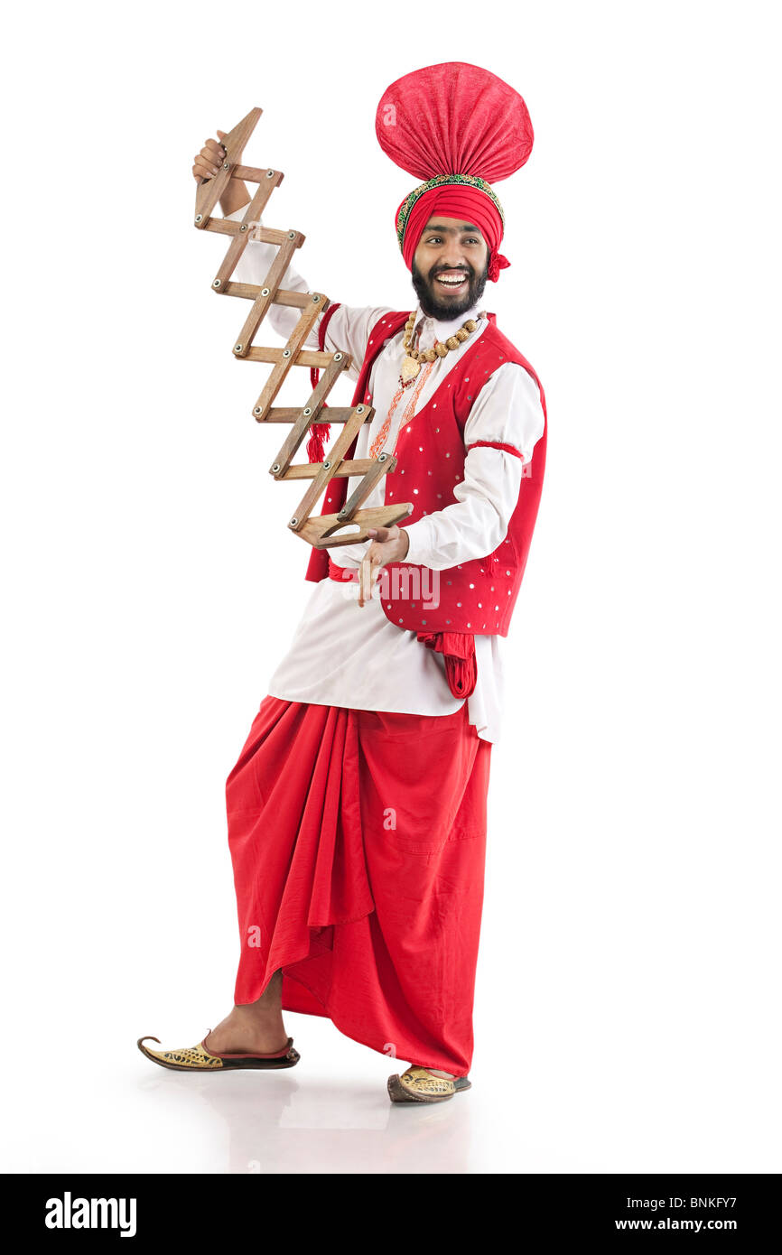 Homme Sikh tenant un supp Banque D'Images