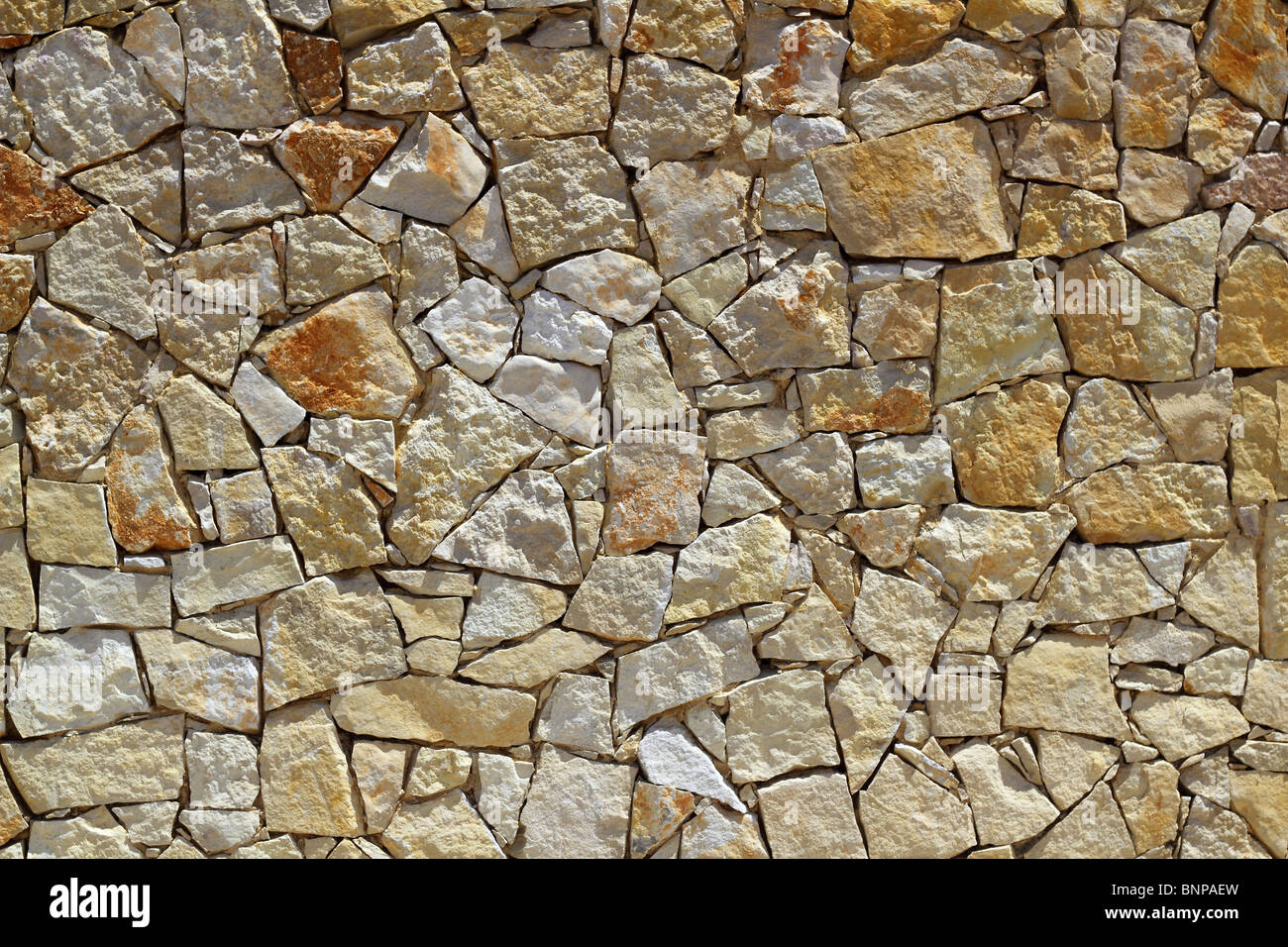 Mur de pierre maçonnerie construction rock texture background pattern Banque D'Images