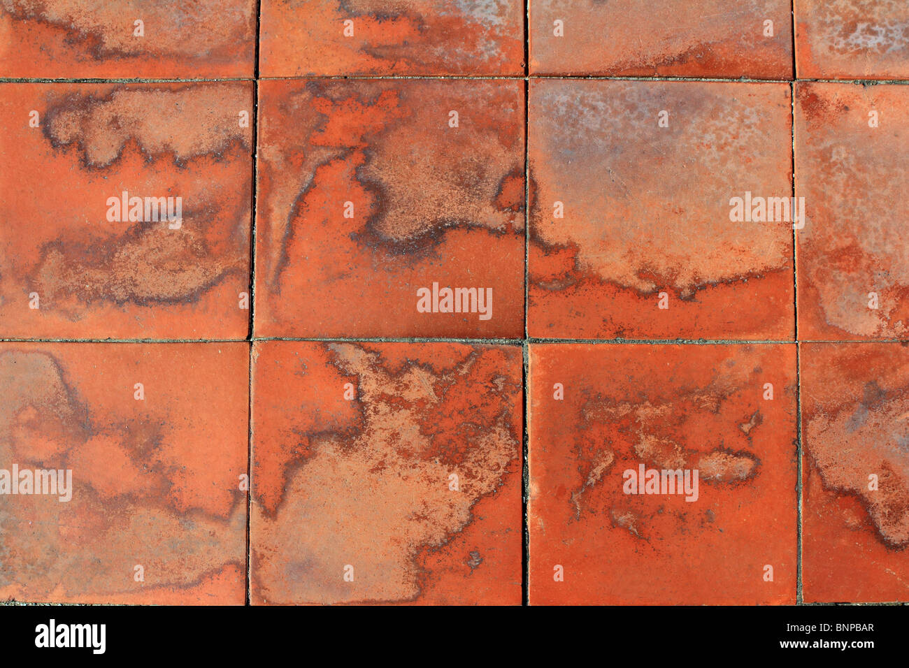 Place rouge de l'argile du sol carrelage texture de fond mediterraenan Espagne Banque D'Images