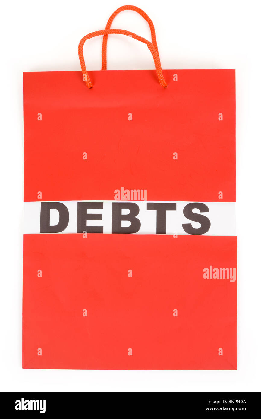 Panier et dettes mot concept de difficulté financière Banque D'Images