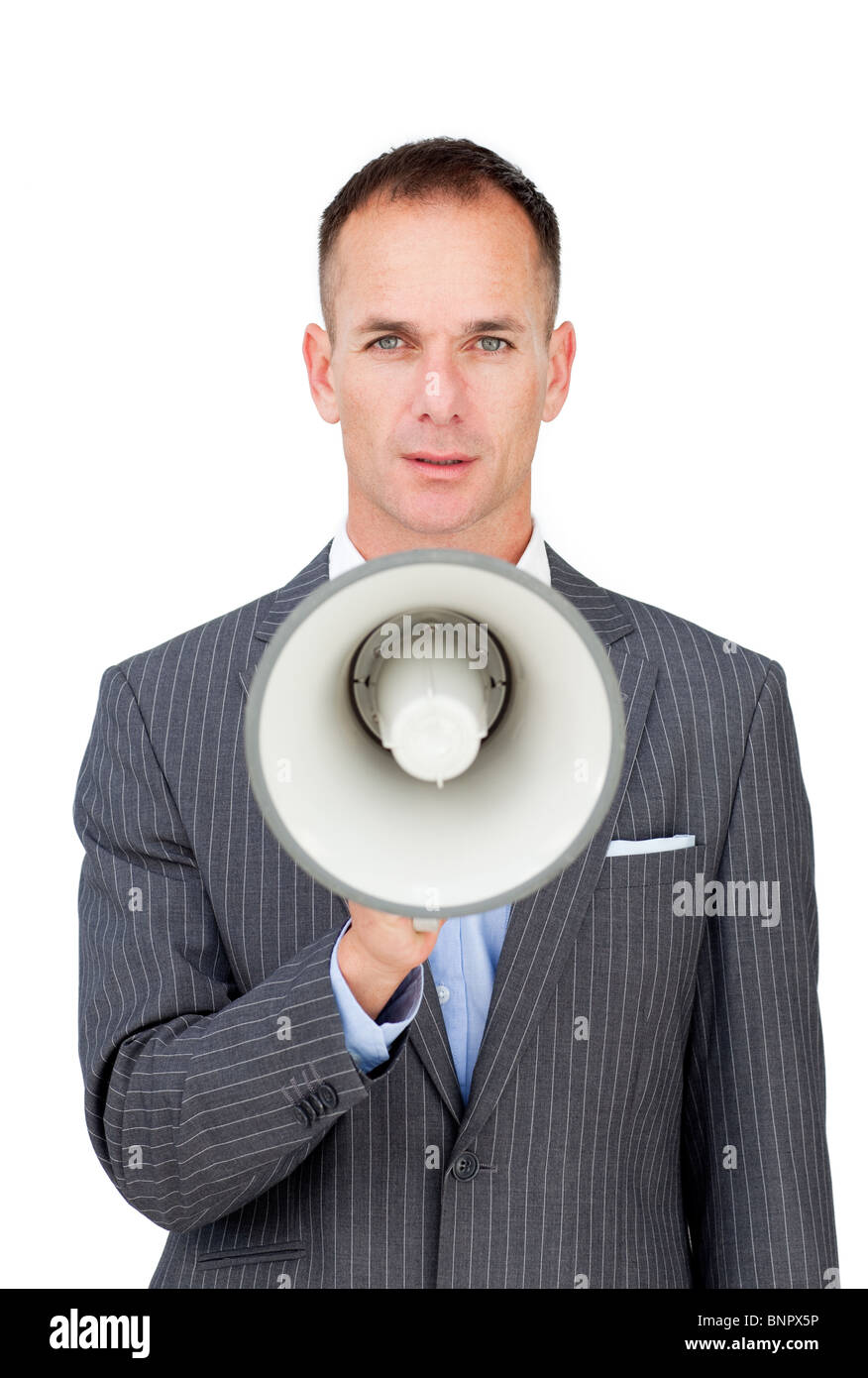 Serious businessman holding a megaphone Banque D'Images