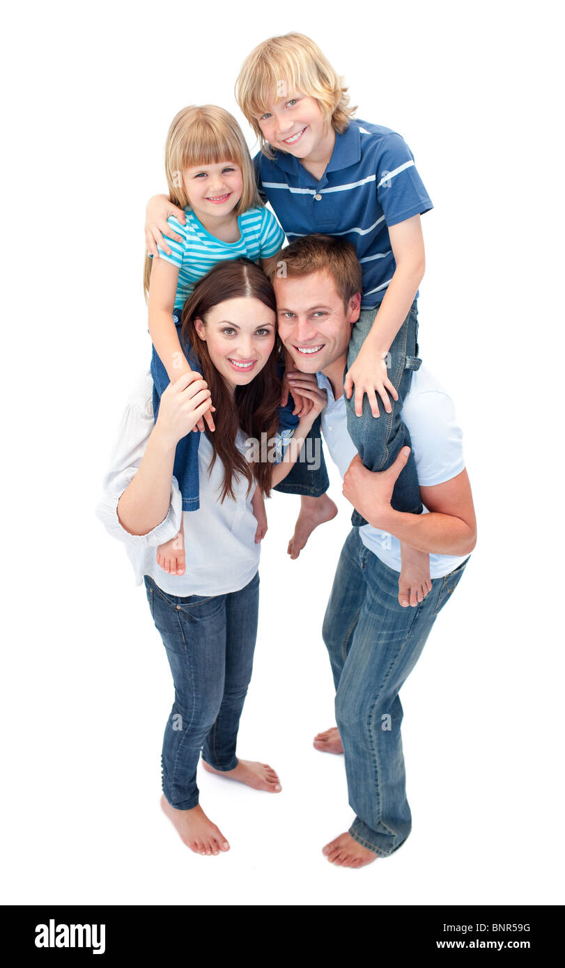 Smiling Family Against A White Background Banque D'Images