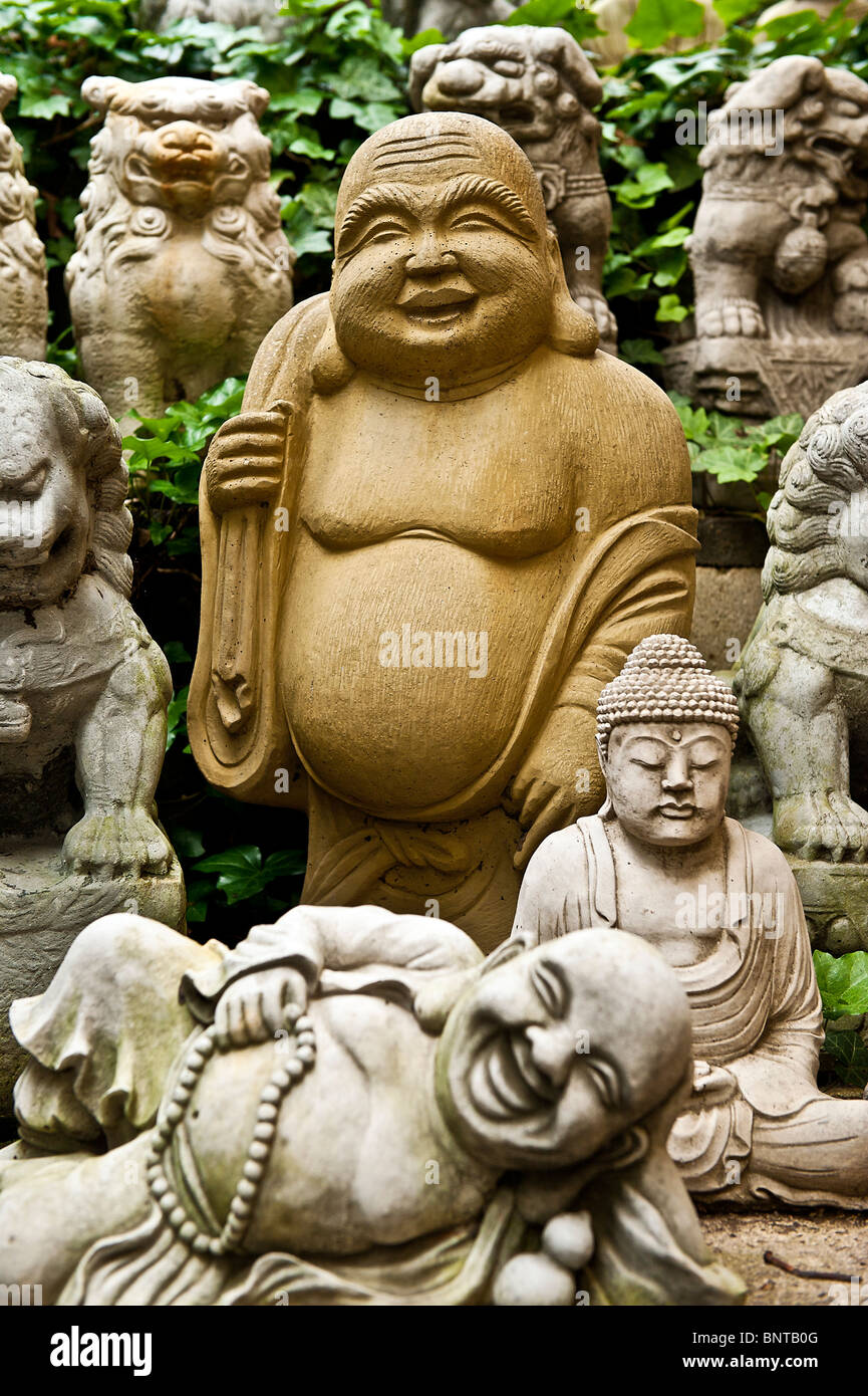Buddha statues de jardin asiatique. Banque D'Images