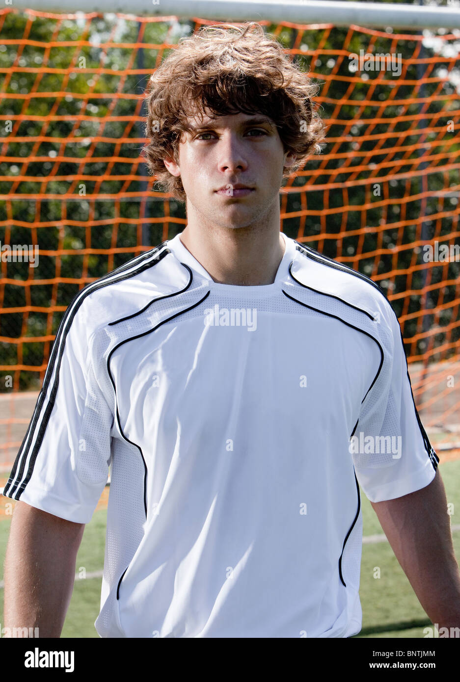 Action sports soccer handsome guy Banque D'Images