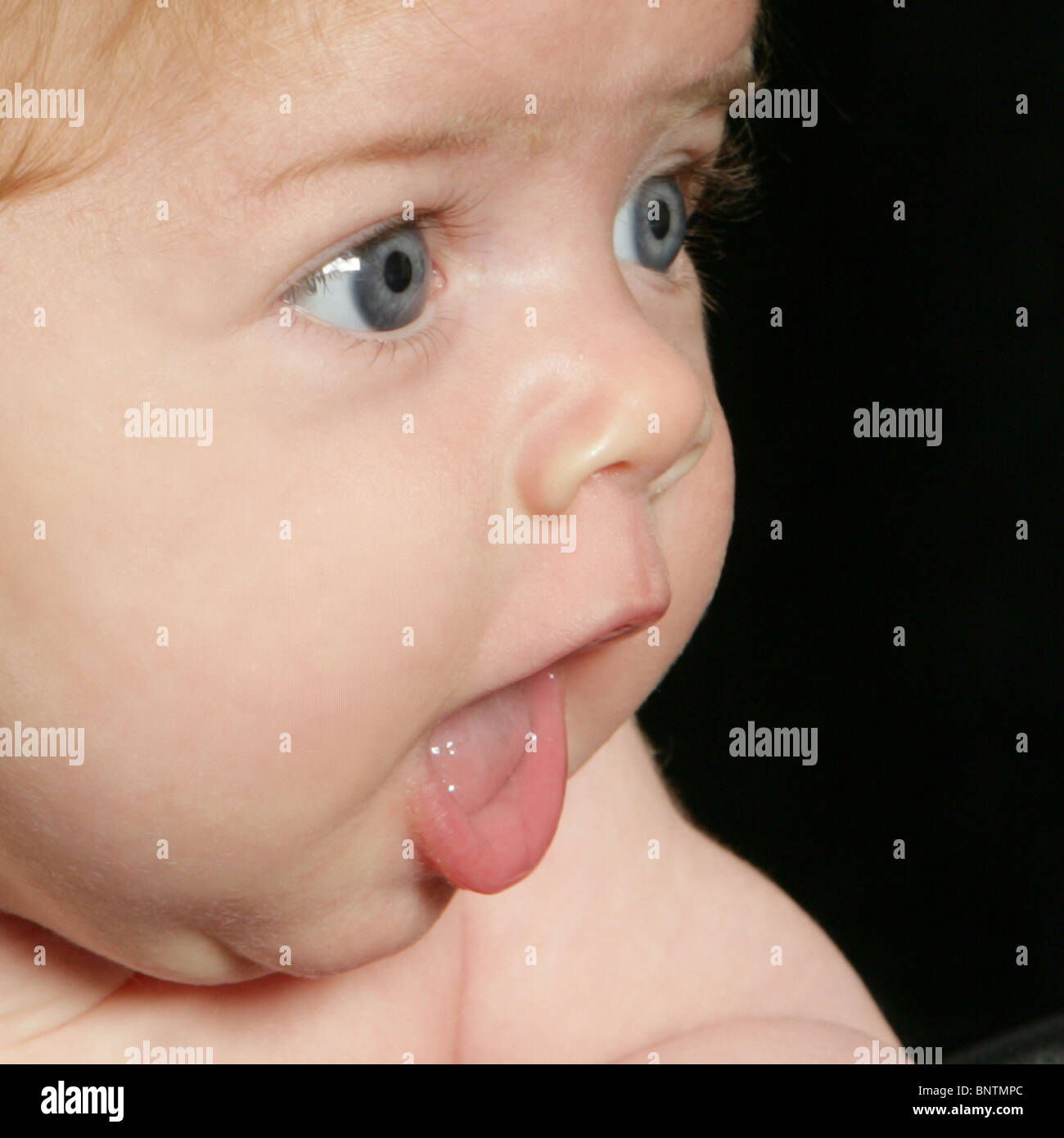Baby face close-up profil rousse Banque D'Images