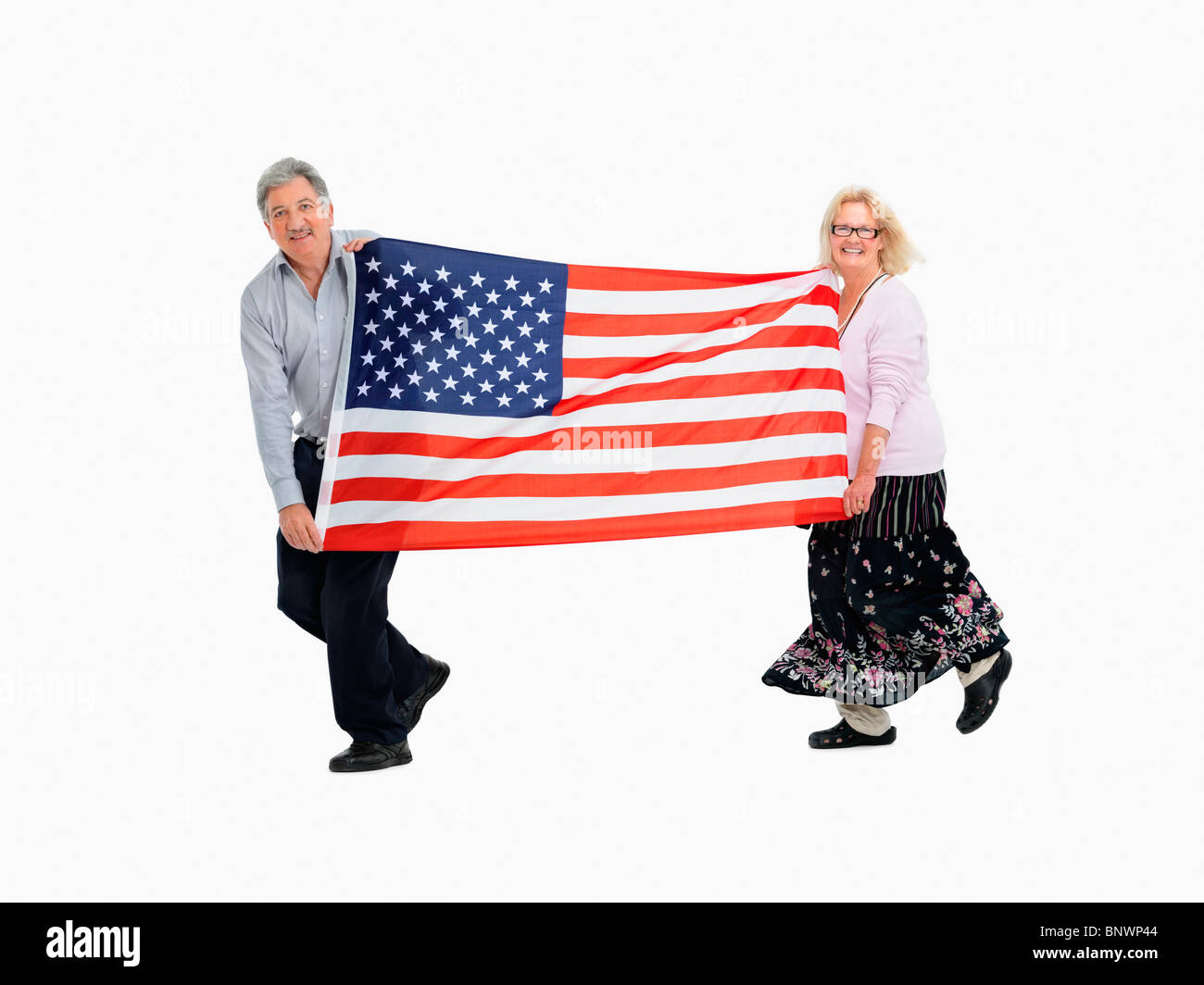 Deux personnes portant le drapeau américain Banque D'Images