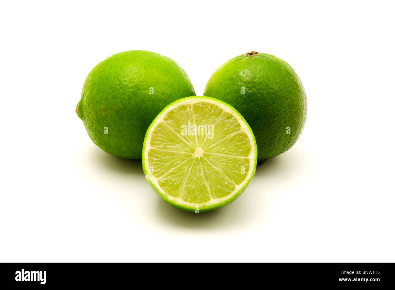 Limes persique sur fond blanc Banque D'Images