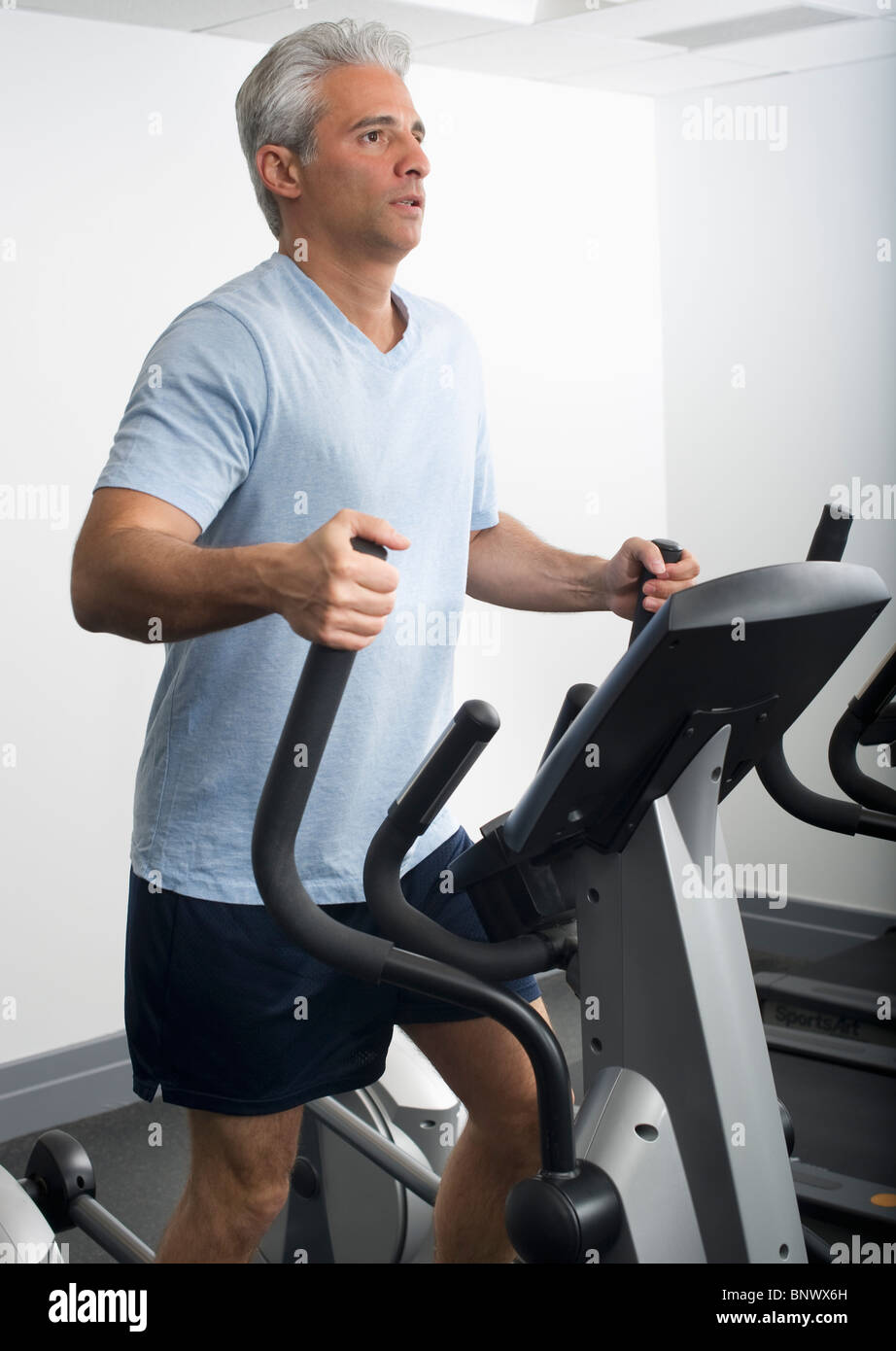 Man exercising on Stairmaster Banque D'Images