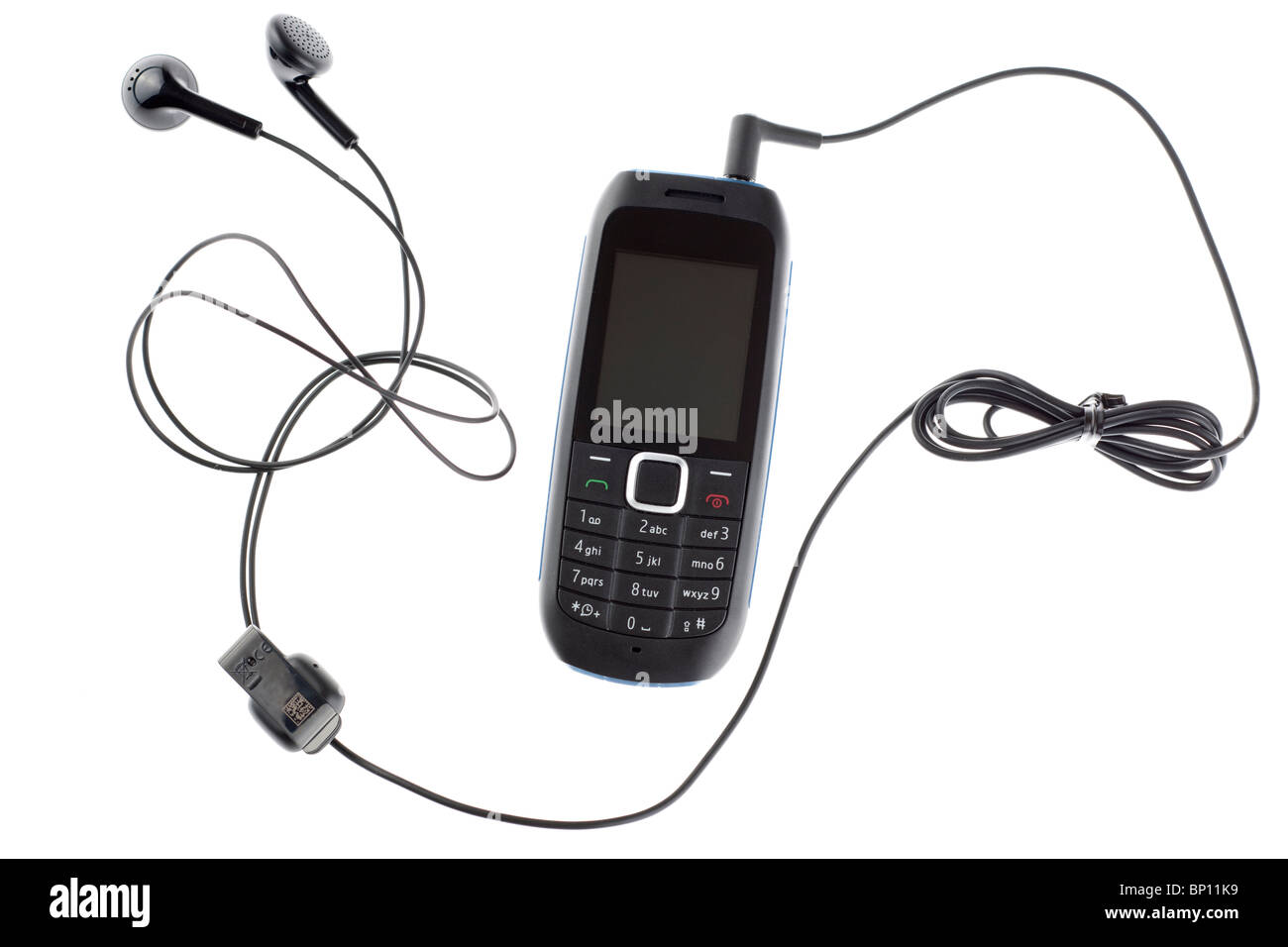 Téléphone mobile avec écouteurs et câble audio ci-joint Banque D'Images