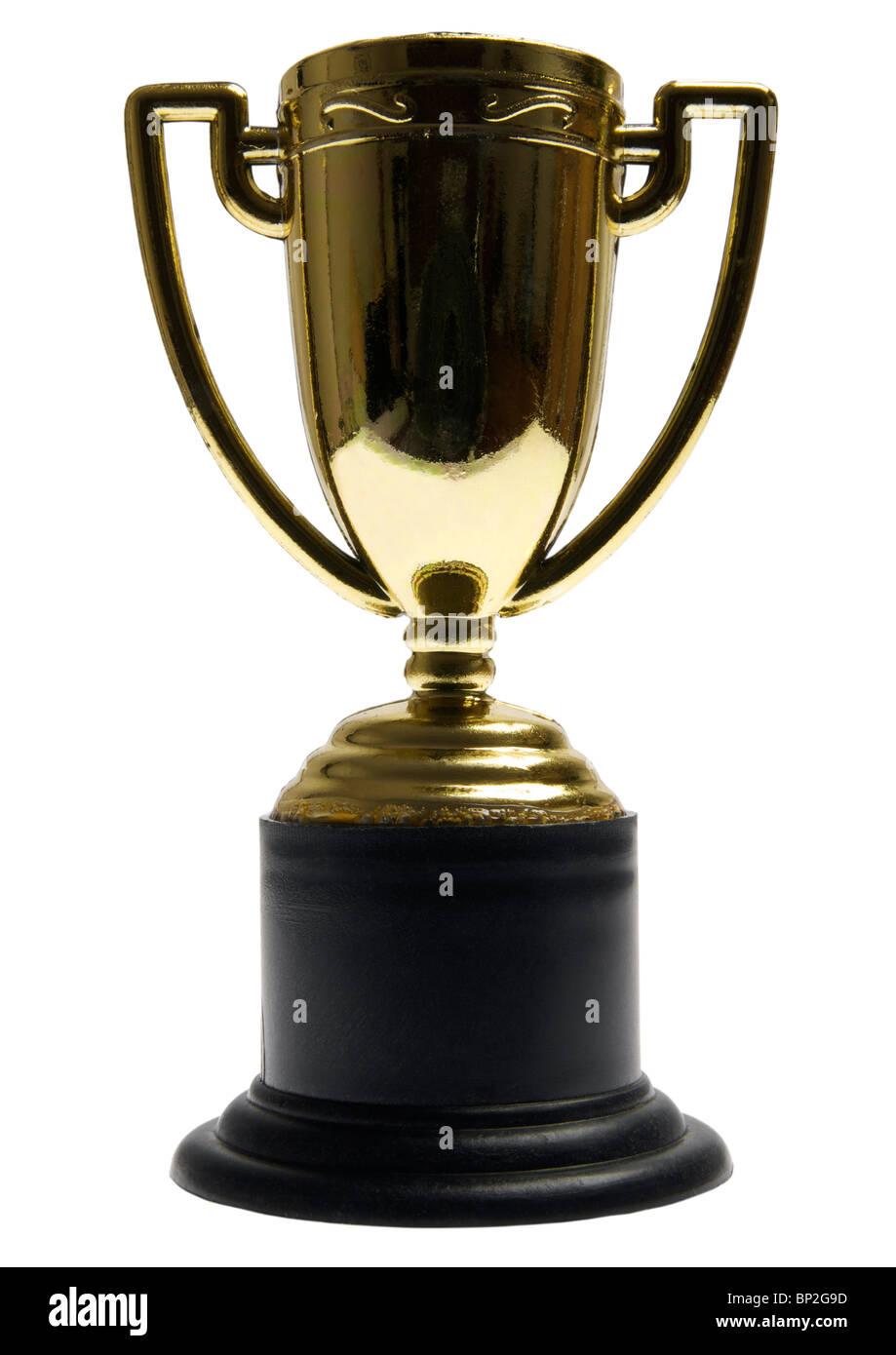 Gold Cup trophée en plastique sur fond blanc Banque D'Images