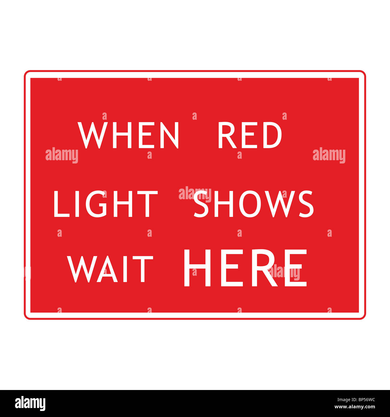 Uk road signe quand la lumière rouge s'arrêter ici montre des signaux de feux de circulation temporaires Banque D'Images