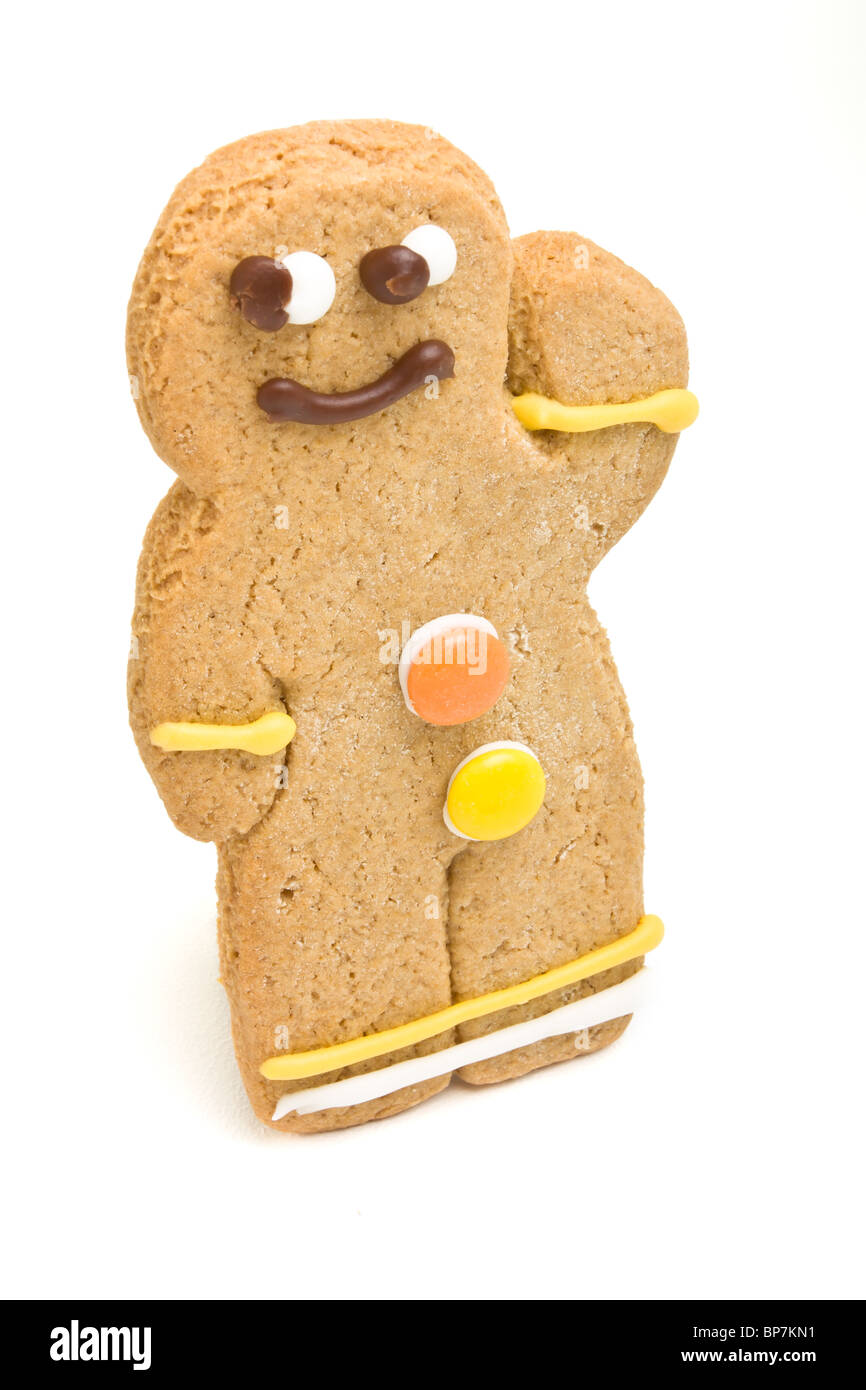Gingerbread Man de perspective faible contre isolé sur fond blanc. Banque D'Images