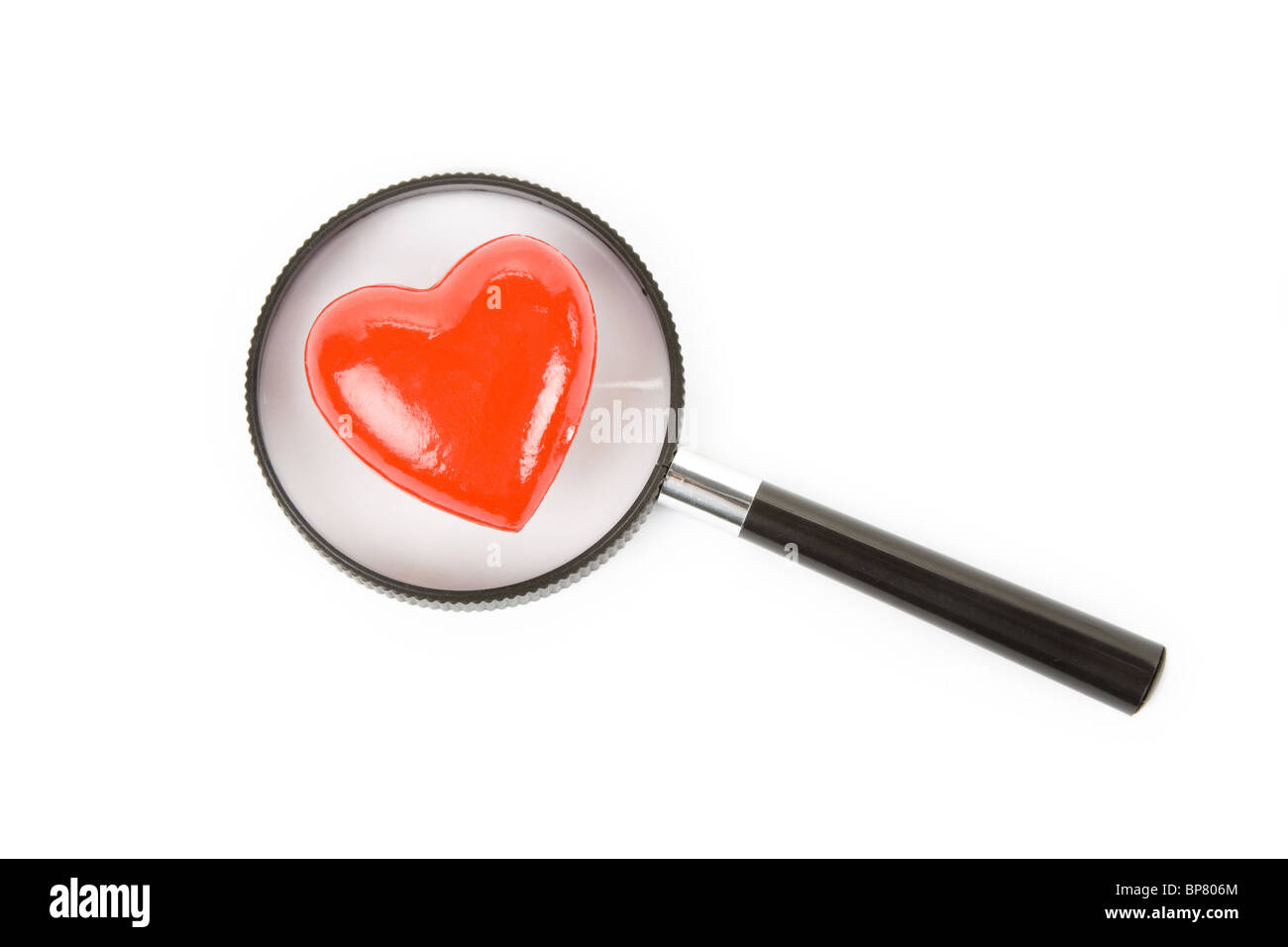 Coeur rouge et la loupe, concept de l'amour de la recherche, l'espérance de vie en Banque D'Images