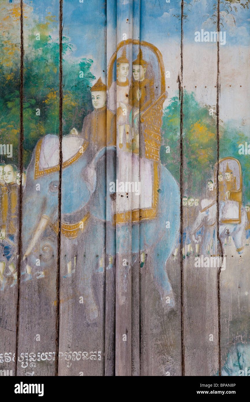 Ancienne peinture sur une porte en bois pagoda - Phnom Penh, Cambodge Banque D'Images