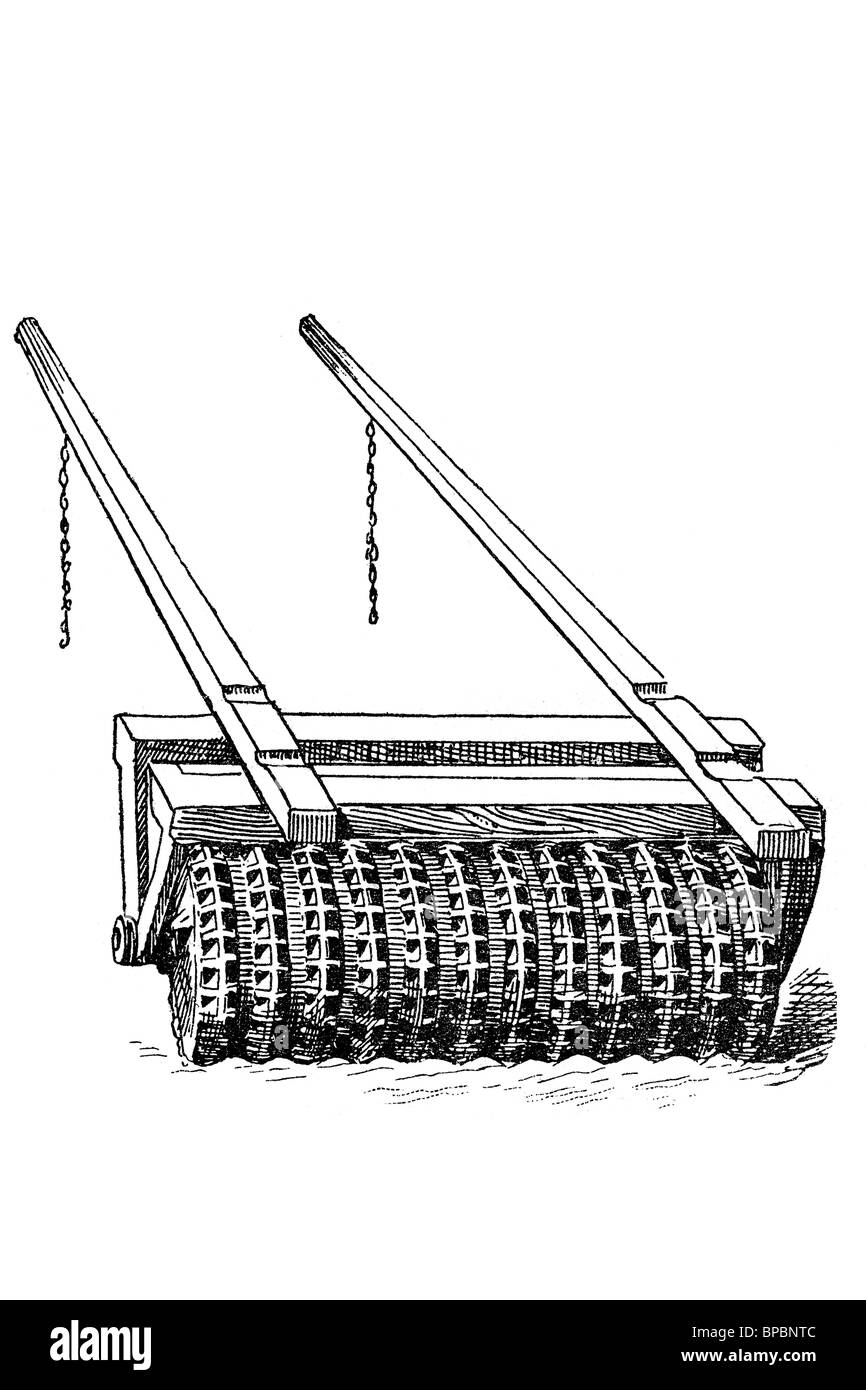 Rouleau cranté pour travailler le sol. Illustration d'antiquités. 1900. Banque D'Images