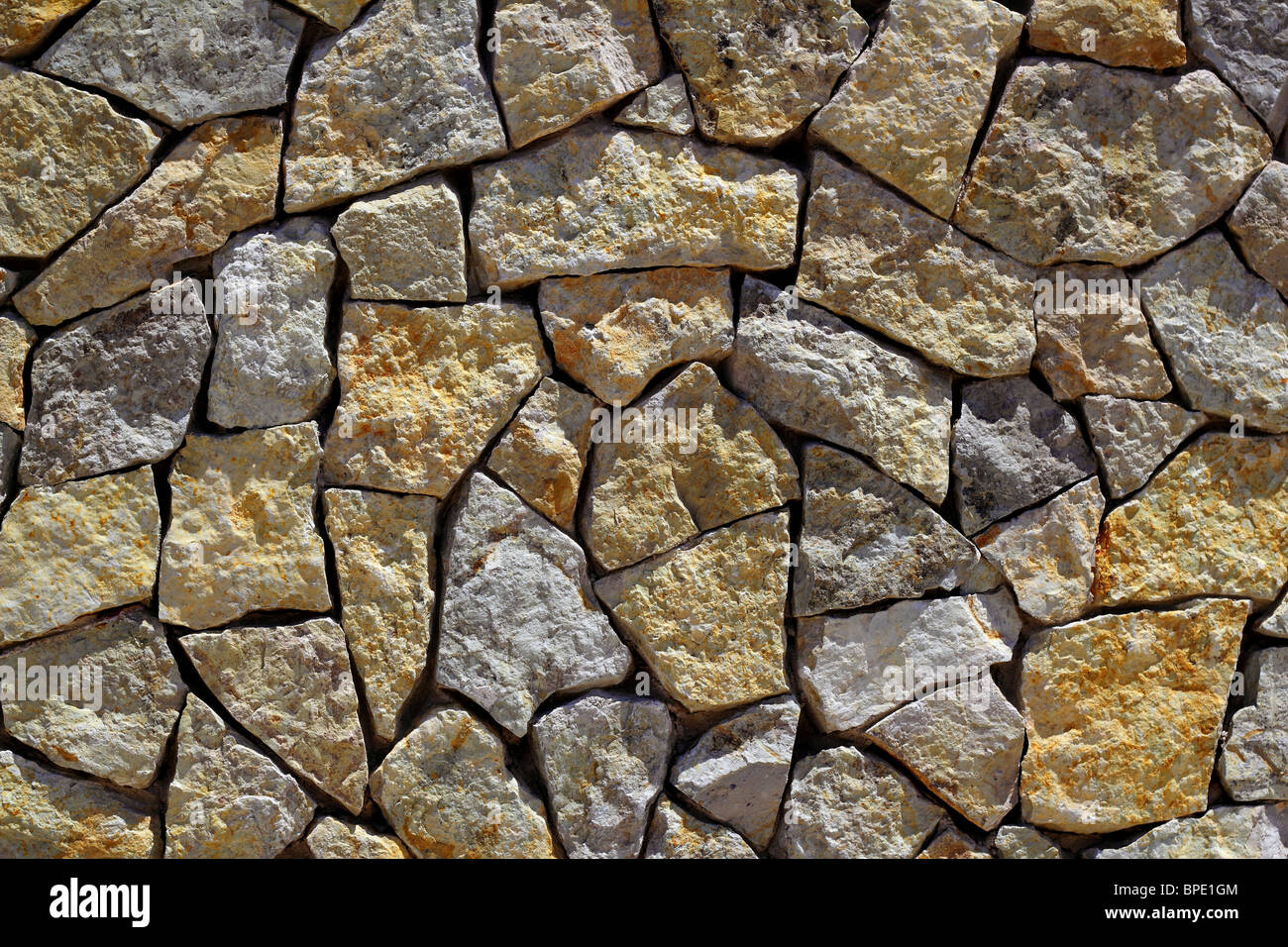 Mur de pierre maçonnerie construction rock texture background pattern Banque D'Images