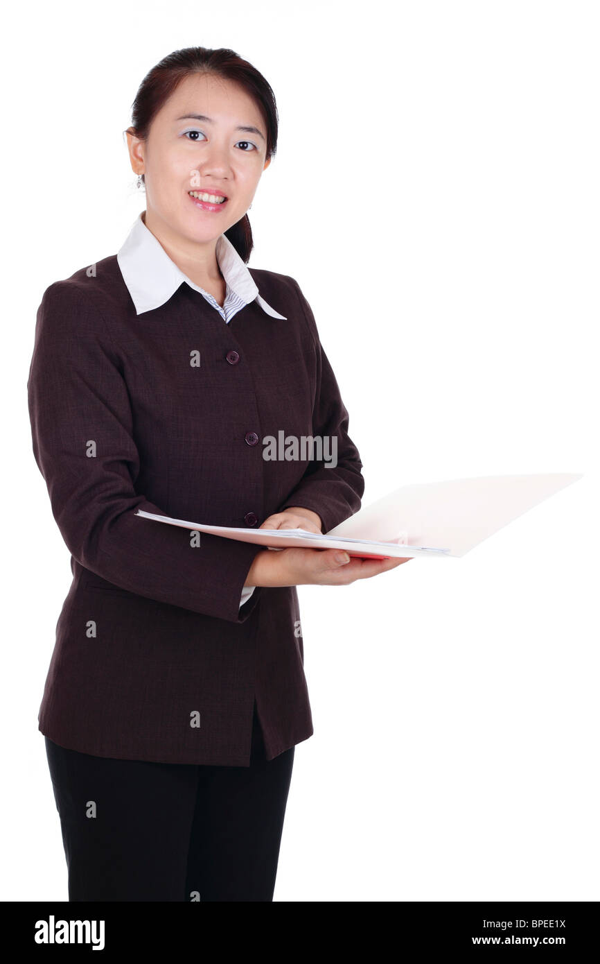 Une asiatique businesswoman holding un dossier Banque D'Images