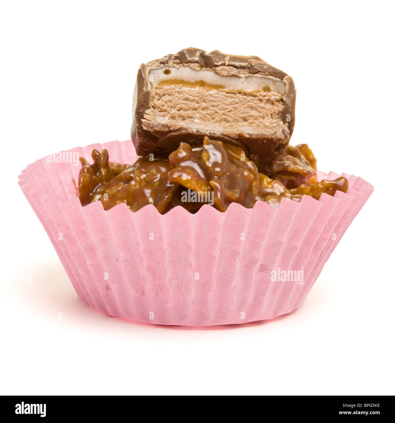 Gâteaux de tasse de céréales à base de céréales et de chocolat fondu caramel bar. Banque D'Images